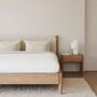 Ethnicraft_52071_PI_Bett_Eiche_Cloud_fabric_160x200_without_slats_removable_cover_Lifestyle